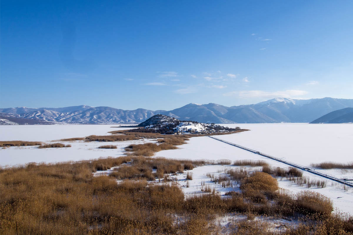 Agios Achilleios and Lesser Prespa Lake in winter- ©Julian Hoffman/ MBPNP Archive